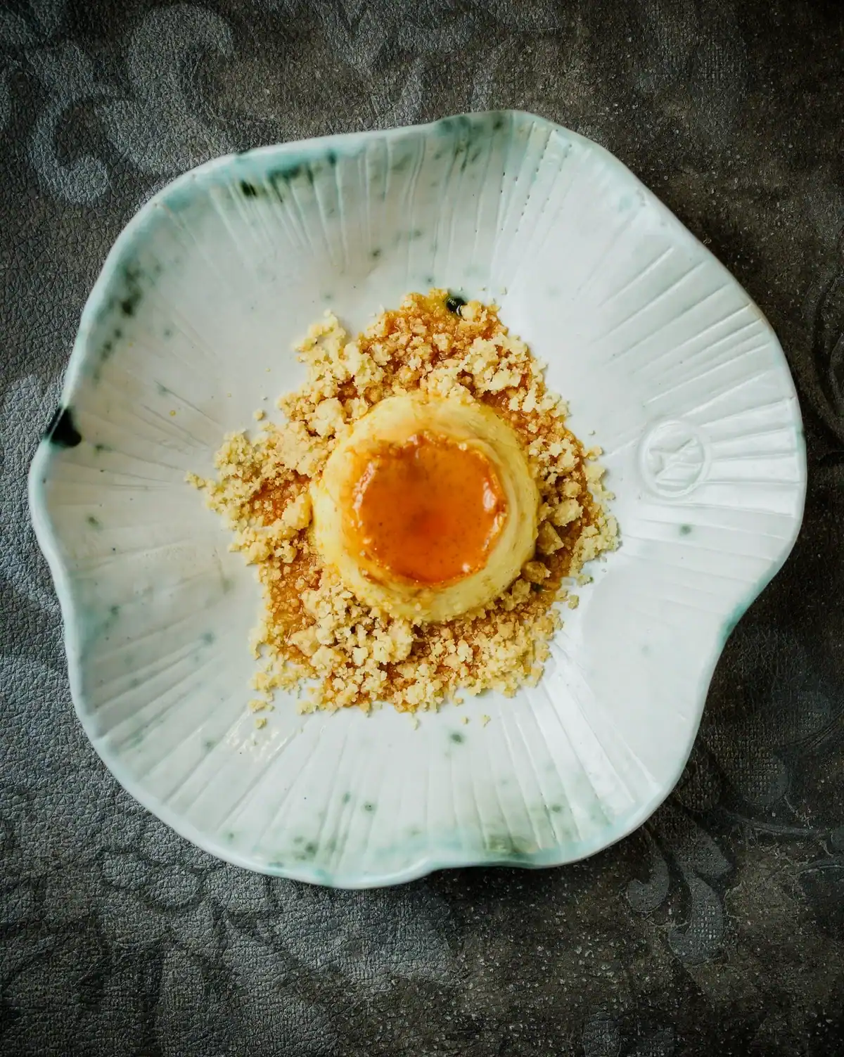 A VIA dessert on a pale ceramic plate